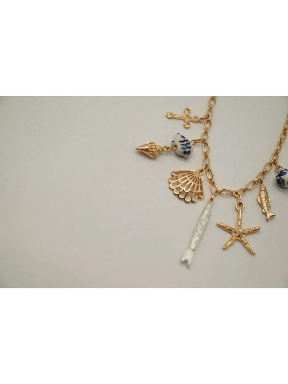 NWT Josslyn Gold Tone Charm Necklace Seashell Starfish Fish Pendant Coastal Boho